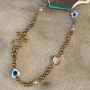 Gold filled multi design stone evil eye with clasp size 7 standard medium